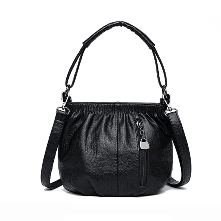 Mjuk läderväska med skrynklig design 👜✨