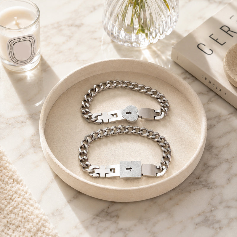 Matching bracelets with a heart-shaped lock