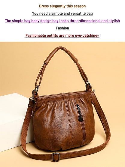 Mjuk läderväska med skrynklig design 👜✨