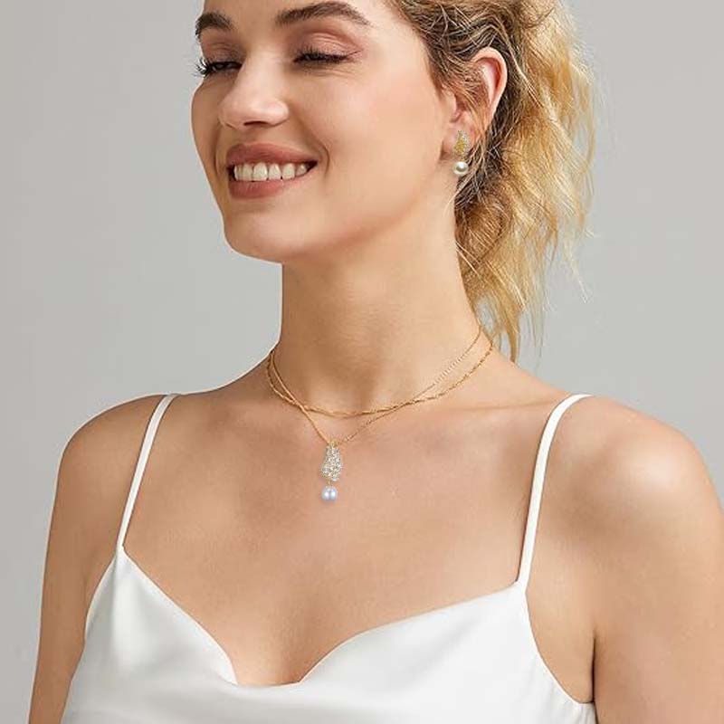 ✨ Pärlörhängen & Halsband med Vingdesign – Elegant Smyckesset för Kvinnor