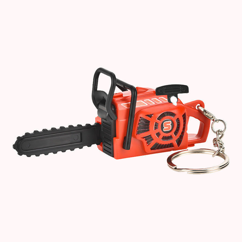 Mini nyckelring med dragsnöre för motorsåg