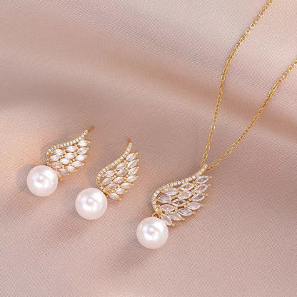 ✨ Pärlörhängen & Halsband med Vingdesign – Elegant Smyckesset för Kvinnor
