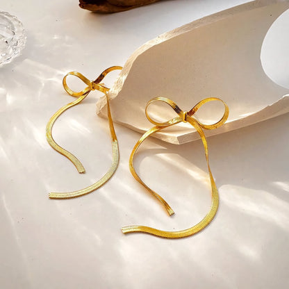 Snygga Bow Tassel Örhängen
